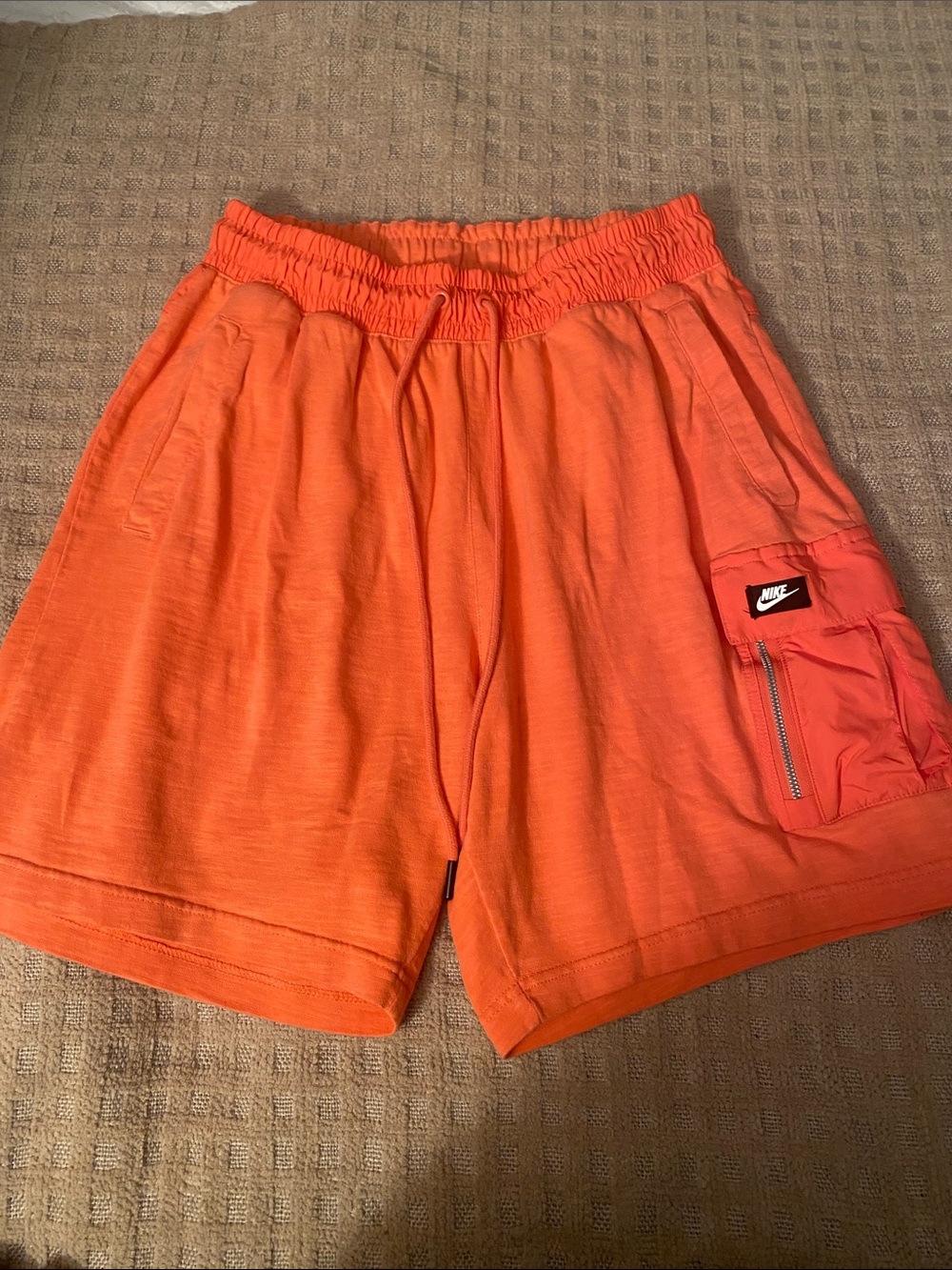 Nike women’s Bright Orange Cargo Zip Shorts